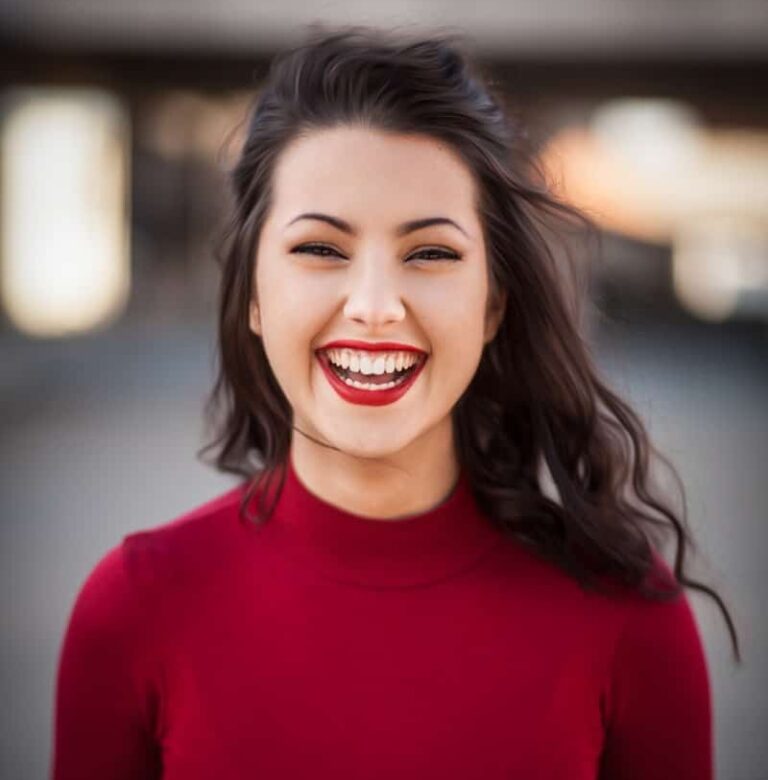 closeup photography of woman smiling